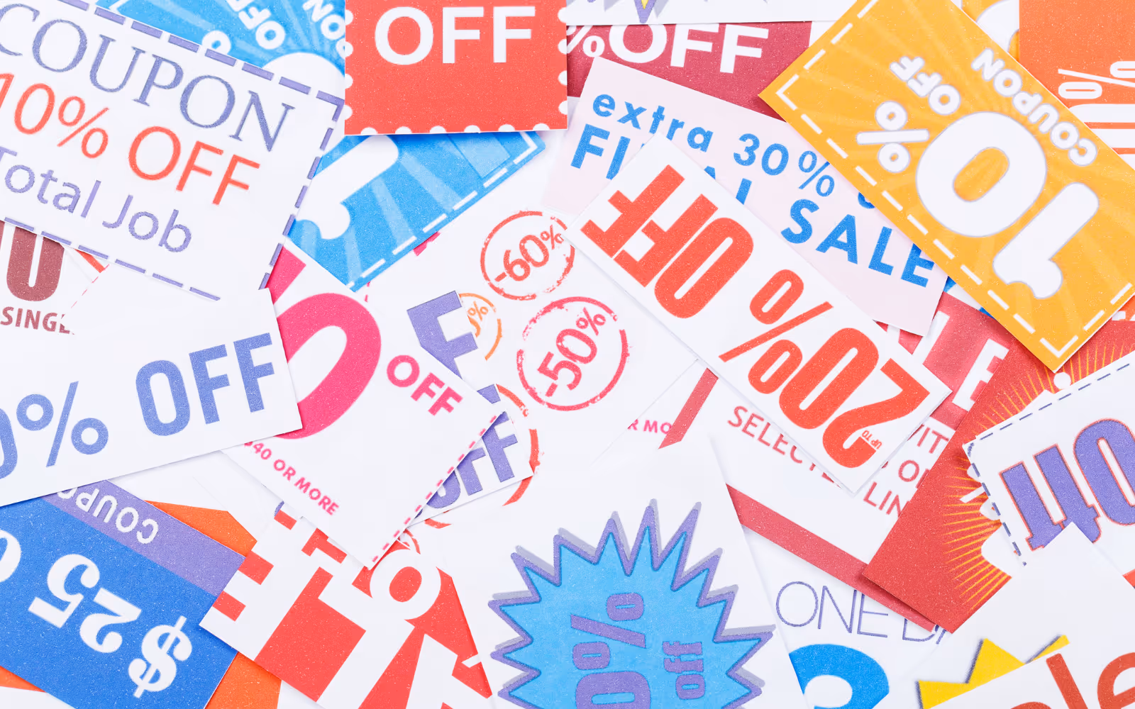 Discount tags in an Australian retail store highlighting price cuts compared to loyalty program rewards